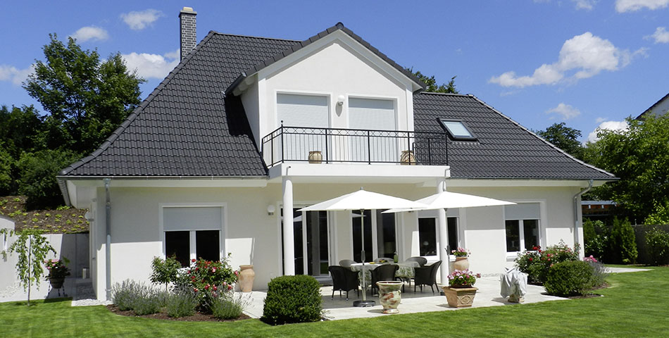 Hausbau in München: Familie Dr. Leitner baut sich ihr exklusives Ziegel-Massiv-Traumhaus