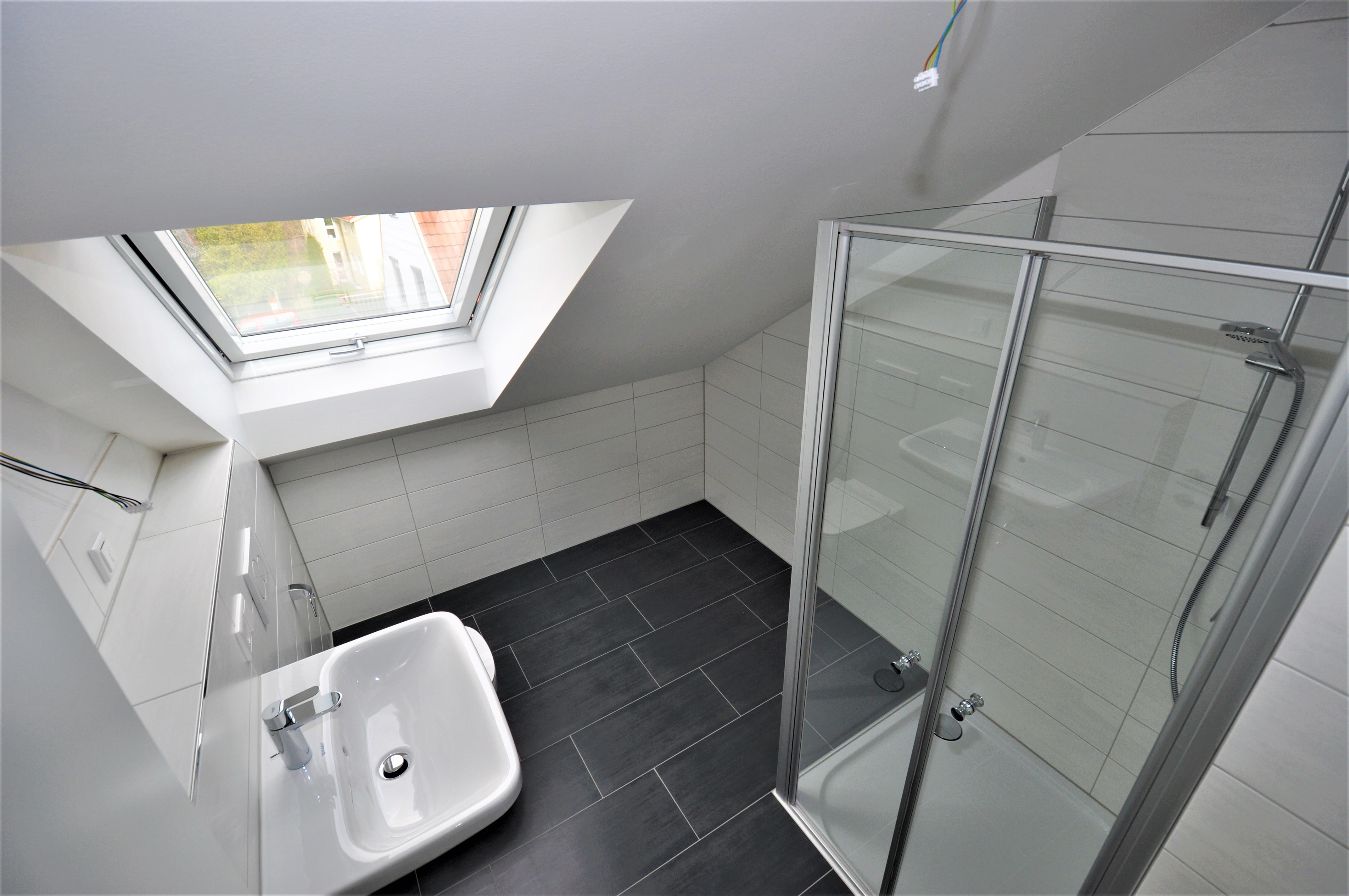 Mehrfamilienhaus bauen: Moderner 3-Spänner in München