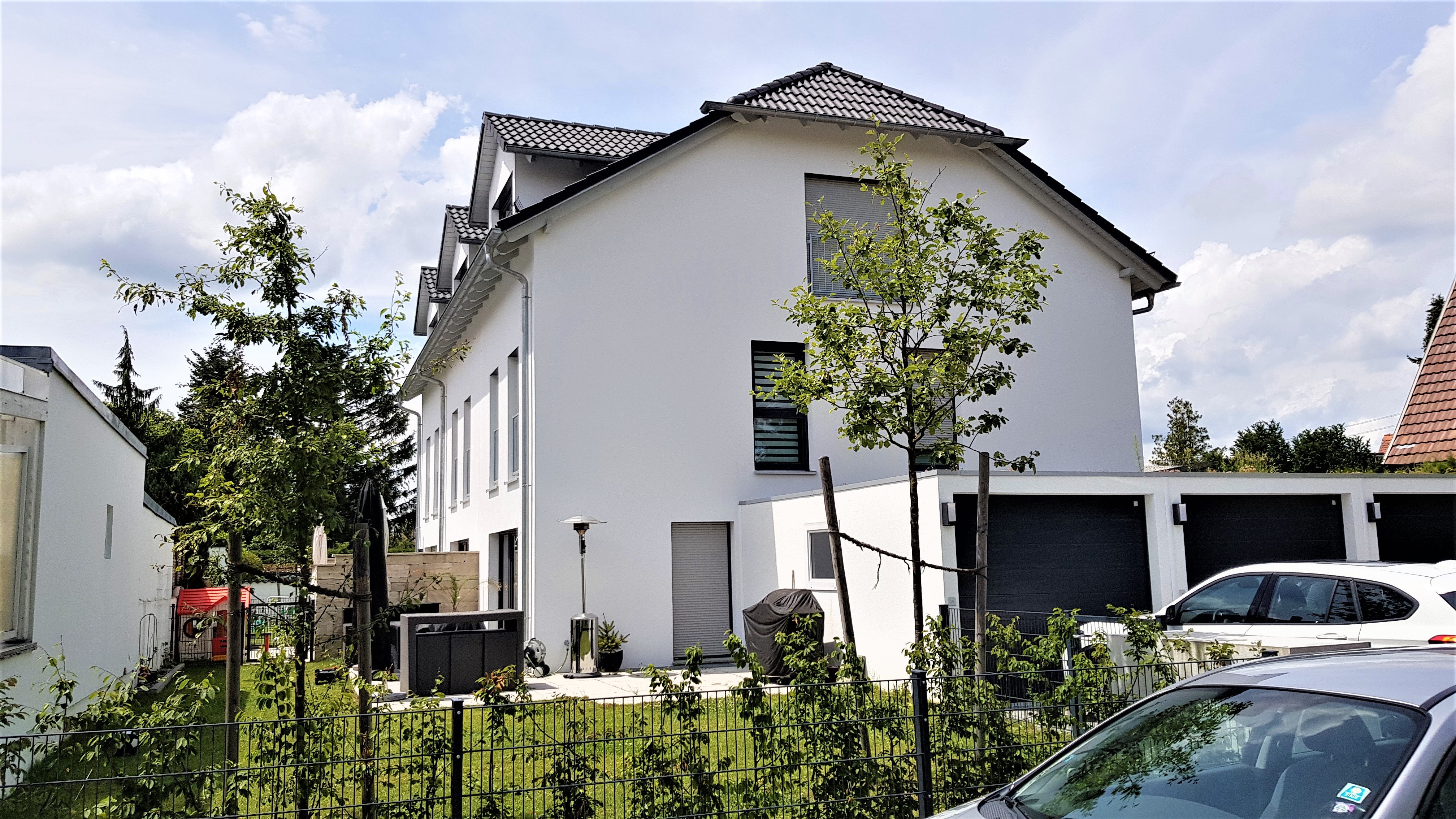 Mehrfamilienhaus bauen: Moderner 3-Spänner in München